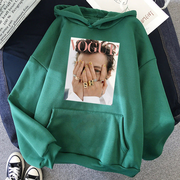Large green Harajuku hoodie with Vogue print and bat sleeves.