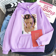 Ladies purple Harajuku hoodie with Vogue print and bat sleeves, displayed with jeans and magazine.