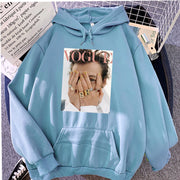 Hoodie Ladies Pullover in light blue with Vogue print, loose fit streetwear style, medium length with bat sleeves.