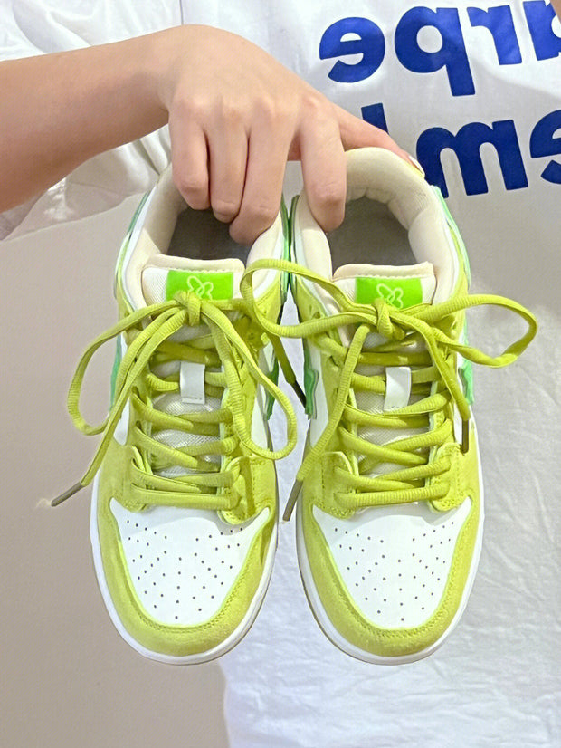 Apple green retro casual sneakers with lace-up design and flat rubber heel.