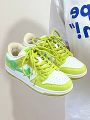 Apple green retro casual sneakers for men with lace-up design and flat rubber sole.