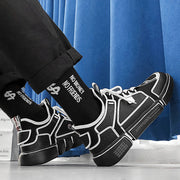 Wild white sneakers men's breathable mesh casual shoe in black, shown in action.