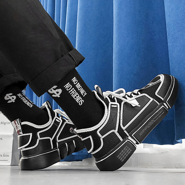 Wild white sneakers men's breathable mesh casual shoe in black, shown in action.