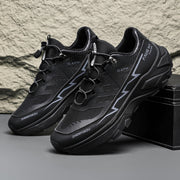 Men's black colorblock sneakers with lace-up design for outdoor activities.
