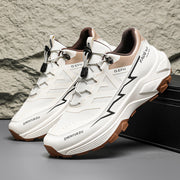 Men's colorblock sneakers with flat heel, front lace-up, and rubber sole, ideal for outdoor activities.