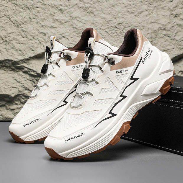 Men's colorblock sneakers with flat heel, front lace-up, and rubber sole, ideal for outdoor activities.