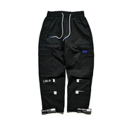 Black streetwear joggers with drawstring waist and multiple pockets.