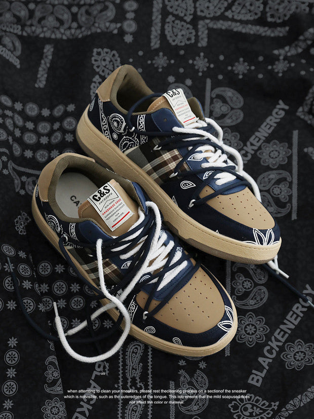 Men's platform sneakers with unique design and lace-up style in cashew flower color.