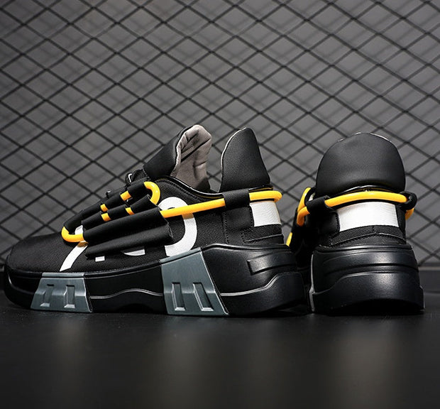 Platform sneakers with front strap, breathable mesh inner, MD sole, and flying line upper in black design.