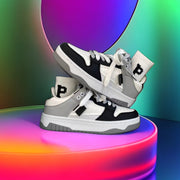 Casual sneakers with a black and white design displayed against a colorful background.