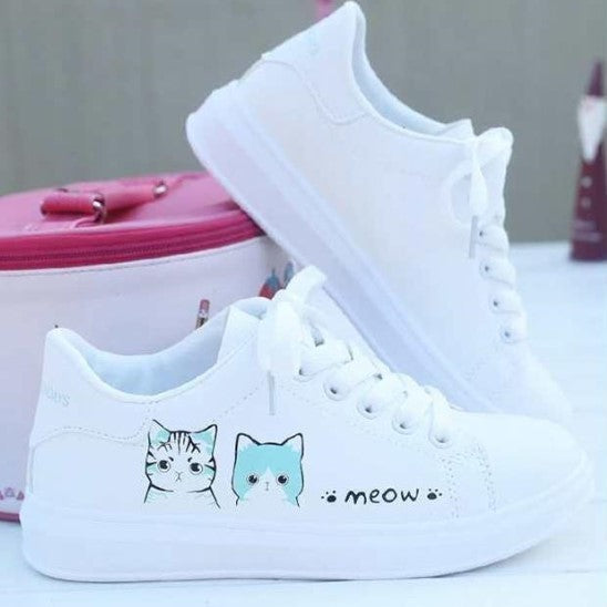Girls' white leather sneakers with cat design and "meow" print, rubber sole, casual flat style.
