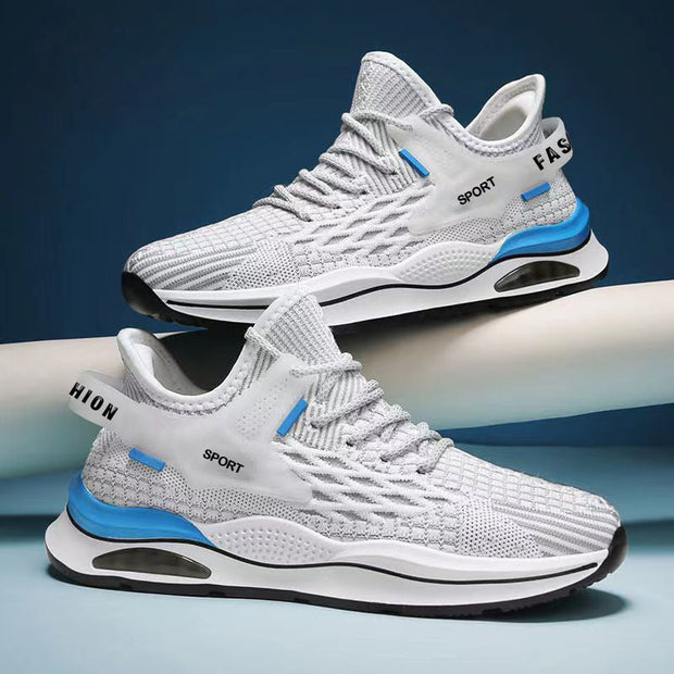 Low-top men's sneakers with a breathable flyknit upper in gray and blue, featuring a flat heel and front lace-up design.