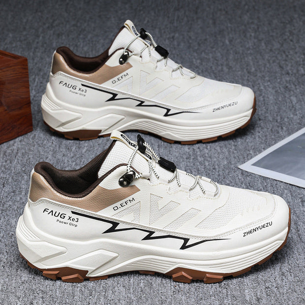 Men's colorblock sneakers with white and brown design, flat heel, rubber sole, and lace-up style for outdoor and sports activities.