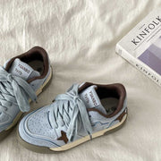 Retro platform star pattern women's casual sneakers in light blue with thick rubber soles and lace-up design.