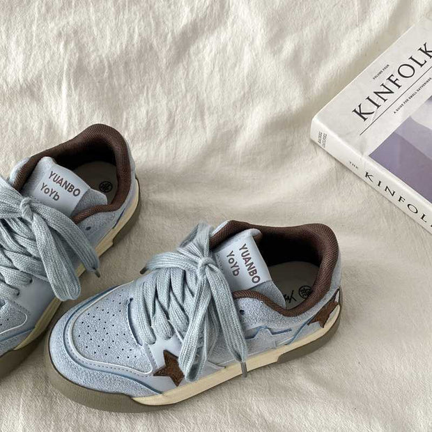 Retro platform star pattern women's casual sneakers in light blue with thick rubber soles and lace-up design.