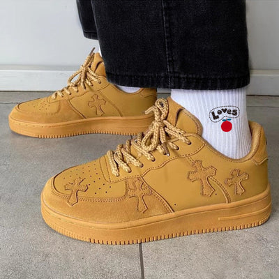 Wheat casual sneakers with low heel and leather stitching design for women.