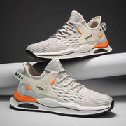 Men's low top casual sneakers with breathable flyknit upper in orange/beige color, featuring front lace-up and PVC sole, suitable for all seasons.