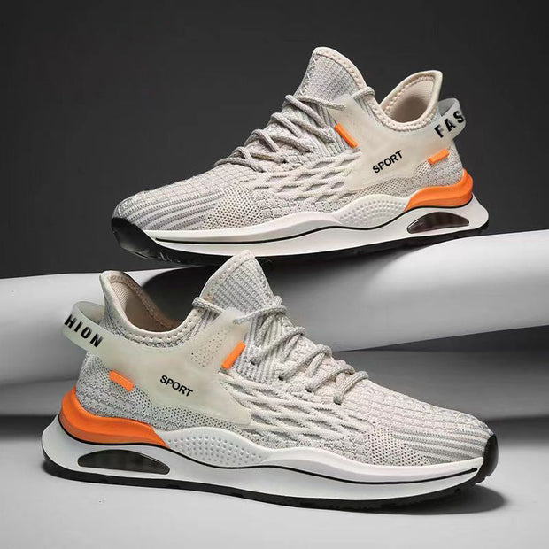Men's low top casual sneakers with breathable flyknit upper in orange/beige color, featuring front lace-up and PVC sole, suitable for all seasons.