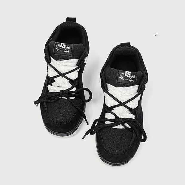 Retro heavy industry women's casual sneakers in black with cross shoulder straps and flat heel.