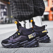 Thick-soled height-enhanced cotton basketball sneakers in black with yellow accents.