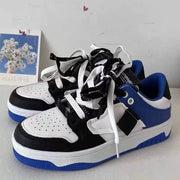 Versatile casual sneakers with blue, black, and white design, perfect for skateboarding and all seasons.