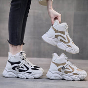 Women's fleece-lined clunky sneakers in black and brown, high-top design, front lace-up closure, rubber sole.