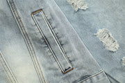Distressed blue denim jacket with pocket detail.