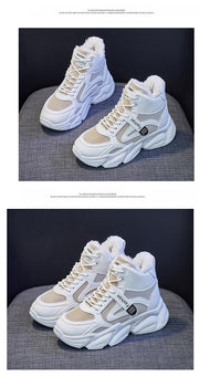 Women's fleece-lined high top sneakers with clunky sole and lace-up design.