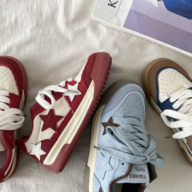 Retro platform star pattern women's casual sneakers in burgundy, autumn wave blue, and denim blue on a fabric background.