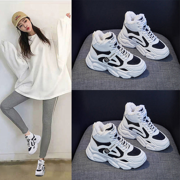 Fleece-lined clunky sneakers for women, warm high top design, lace-up front, shown in black and white with rubber sole.