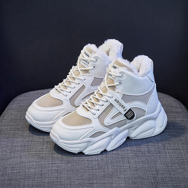 Women's fleece-lined high top sneakers with lace-up design and rubber sole.