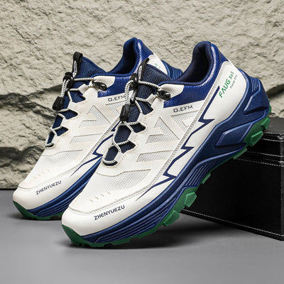 Men's colorblock sneakers in white and blue with front lace-up, flat heel, rubber sole; ideal for outdoor sports.