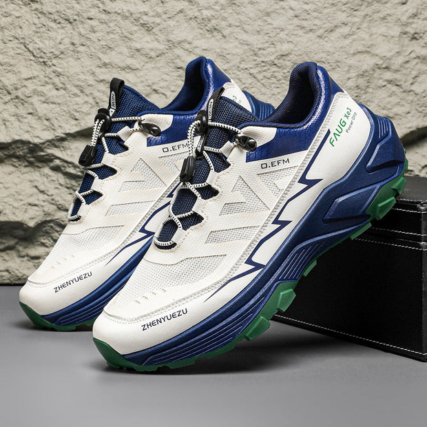Men's colorblock sneakers in white and blue with front lace-up, flat heel, rubber sole; ideal for outdoor sports.