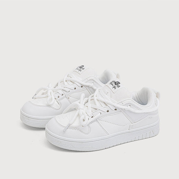Retro heavy industry white sneakers for women with flat heel and mesh lining.